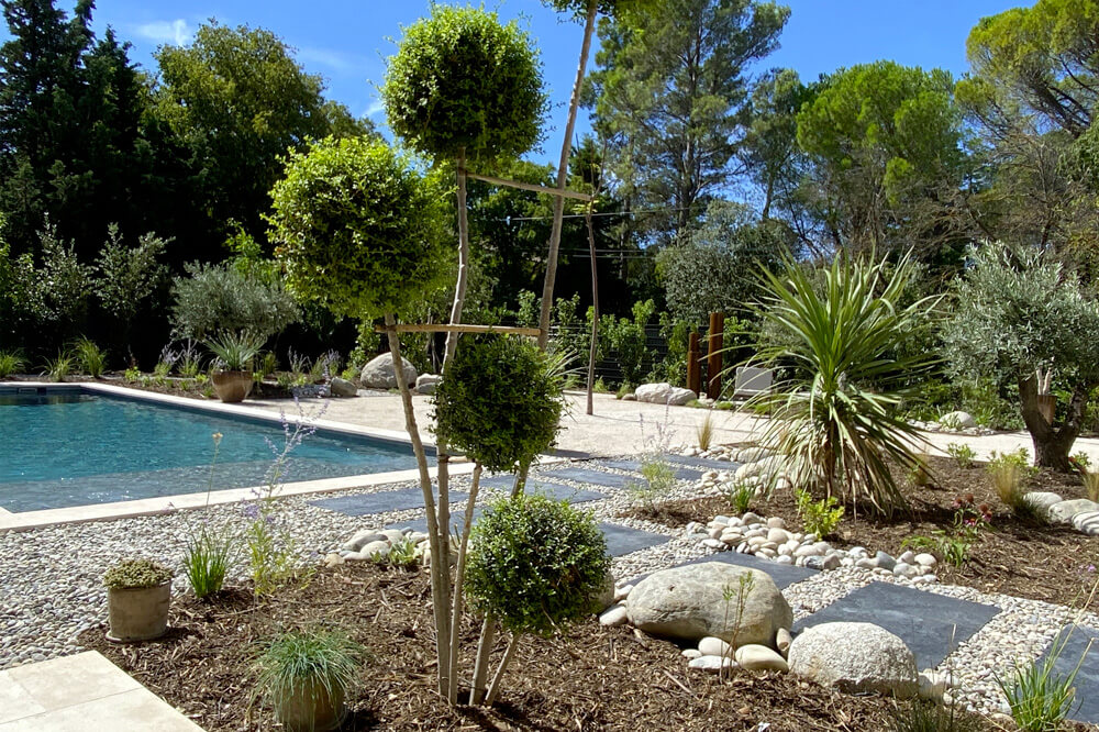Réalisation d'aménagement extérieur - Jardin paysagisme - Pergola - piscine - constructeur piscine Jardin Douce Diffusion